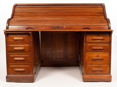 An American roll top desk, fitted two