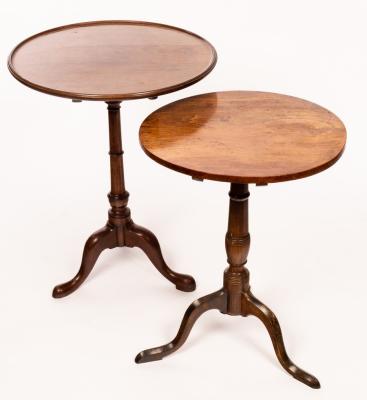 A circular mahogany tripod table