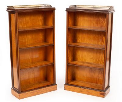 A pair of Edwardian satinwood bookcases