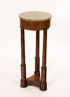 A French Empire walnut gueridon, with