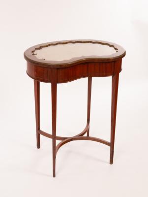 A mahogany kidney-shaped display table,