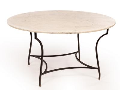A circular marble top table on