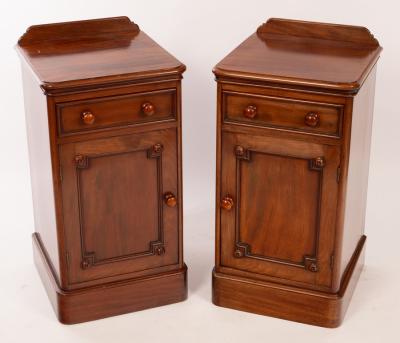 A pair of mahogany bedside tables, each