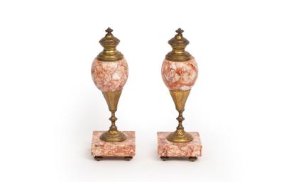 A pair of gilt metal and orange