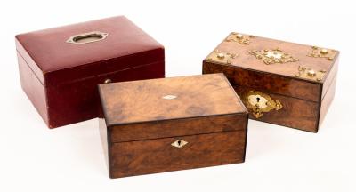 A walnut workbox with brass mounts,