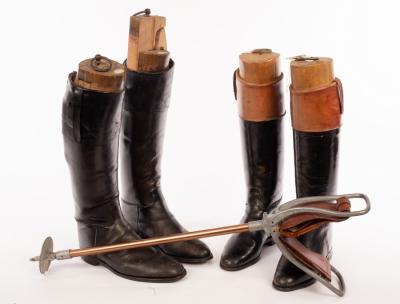 Two pairs of leather riding boots,