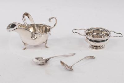 A silver tea strainer and stand, Mappin