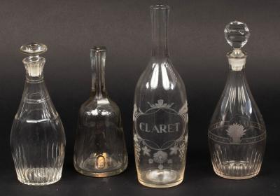 An engraved glass carafe named