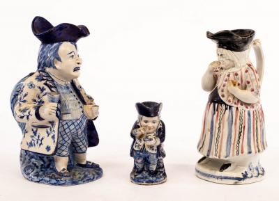 A Delft figural Toby jug of a toper,