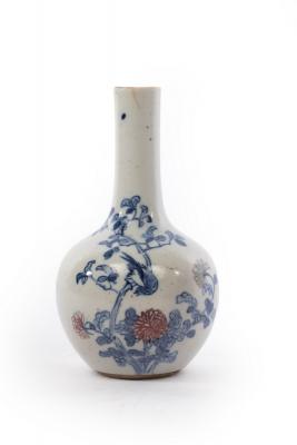 A Chinese vase decorated a bird on chrysanthemums