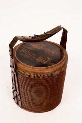 A Japanese wicker basket with handle,