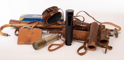 Two telescopes in leather cases, a pair