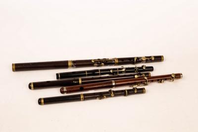A rosewood 5-key flute, 38cm long, another