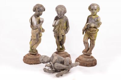Three lead figures of putti, the