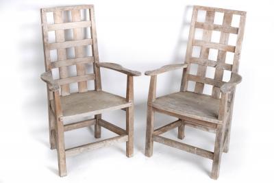 A pair of yew wood garden armchairs 2dc545