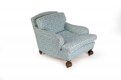 A Howard style deep-seated armchair,