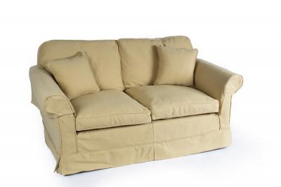A square framed sofa fitted loose cushions