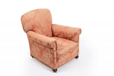 An upholstered armchair with rocking