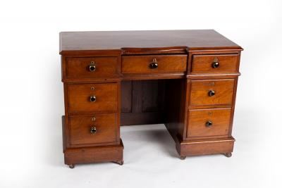 A Victorian mahogany desk fitted