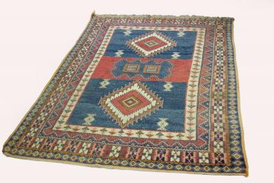 A Hamadan rug, the central blue