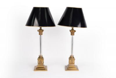 A pair of table lamps with clear
