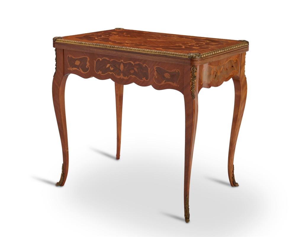 A LOUIS XV-STYLE GAME TABLEA Louis