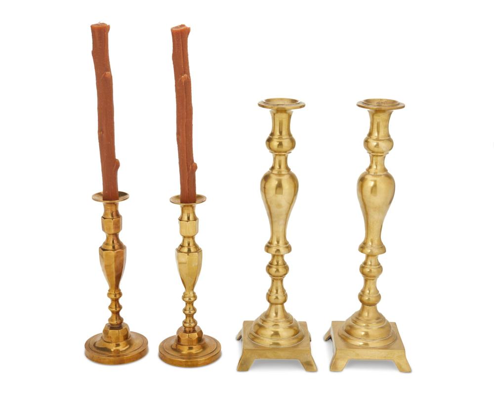 A GROUP OF BRASS CANDLESTICKSA 2dacfe