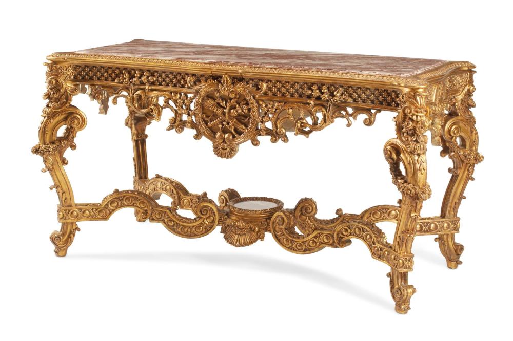 A FRENCH REGENCE-STYLE GILTWOOD