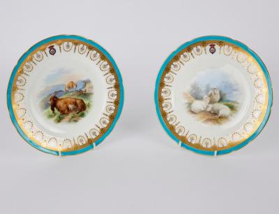 A pair of Minton plates painted