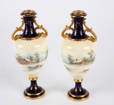 A pair of Coalport vases with continuous 2dd674