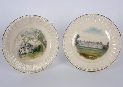 A pair of Belleek pierced plates painted