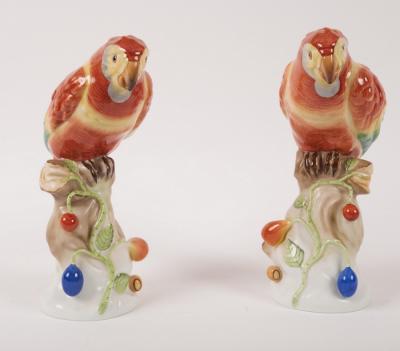 A pair of Herend models of red parrots
