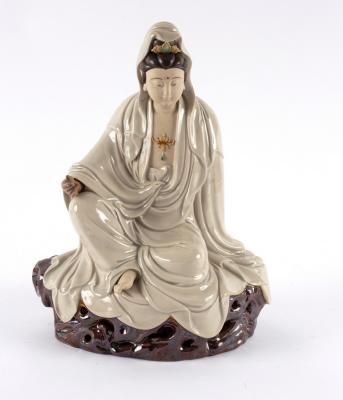 A Chinese pottery figure by Liu