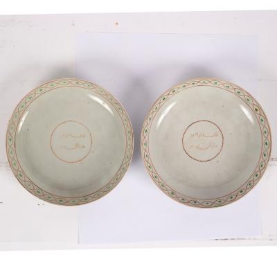 A pair of Chinese saucer dishes,