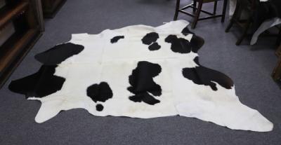 Two black and white hide skin rugs  2dd797