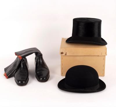 A black silk top hat by Henry Heath