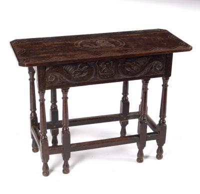 A carved oak side table, 17th Century