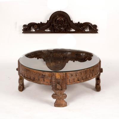 An Indian circular carved drum-top table