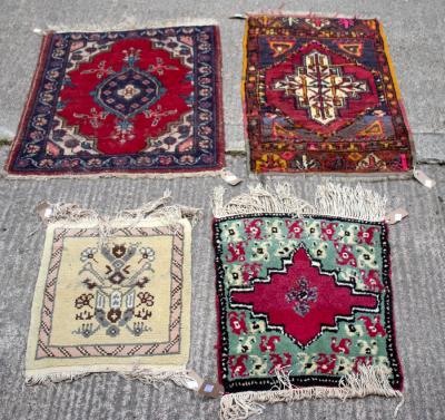 A collection of small rugs comprising  2dd89a