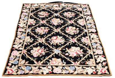 A modern needlepoint rug decorated