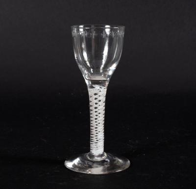 An 18th Century cordial glass with engraved
