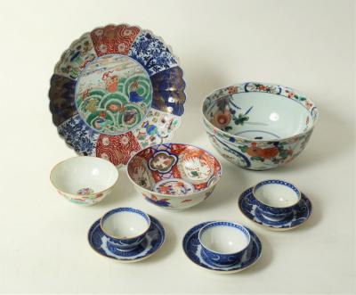 An Imari saucer dish with fluted