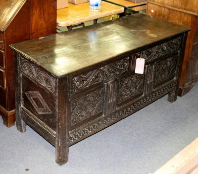 An 18th Century carved oak coffer