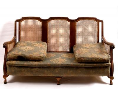 A bergère suite of caned furniture,