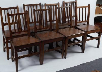 Eight country made oak single chairs,