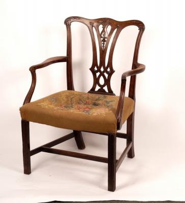 A George III mahogany armchair of Chippendale