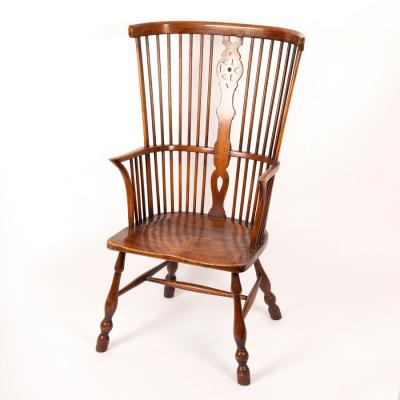 A Windsor type comb back chair with