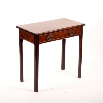 A George III mahogany table, drawer