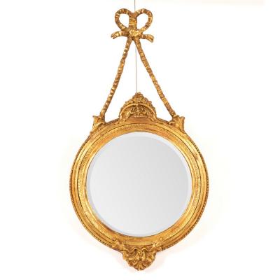 A circular gilt framed wall mirror 2ddb7f