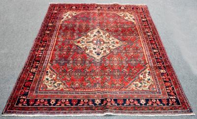 A Hamadan rug with central geometric
